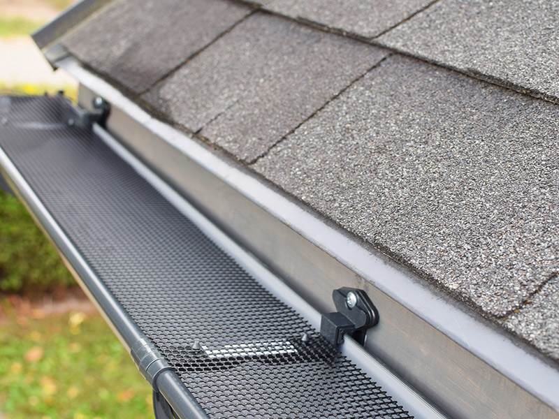 metal gutter installed at house roof close up woodstock ga